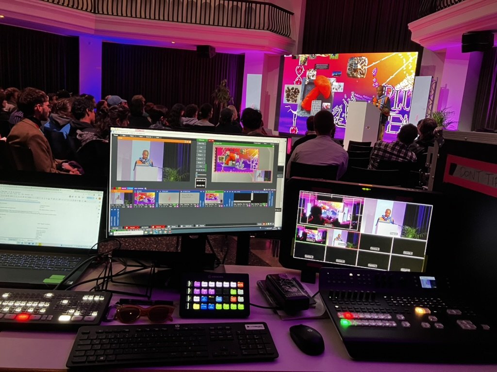 A MAZE Festival livestream — Mariana's editing setup with multiview and switcher, full room