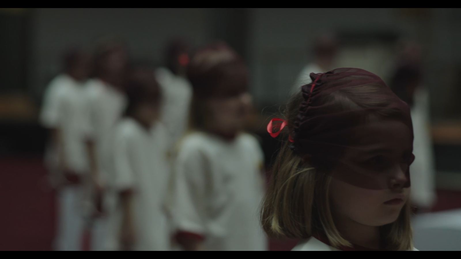 Dream Baby Dream — child in soft focus, red hair ribbon