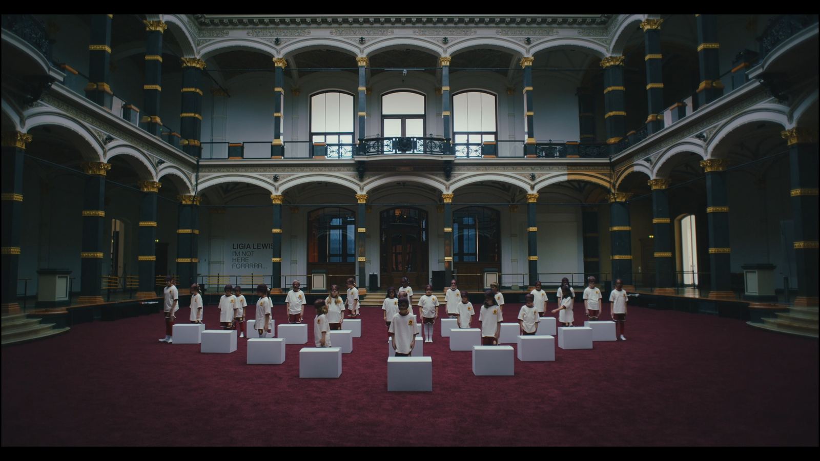 Dream Baby Dream — cast on white pedestals inside a grand hall