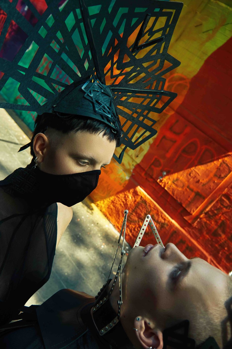 Berlin Freiheit — laser-cut headpiece against a rainbow wall