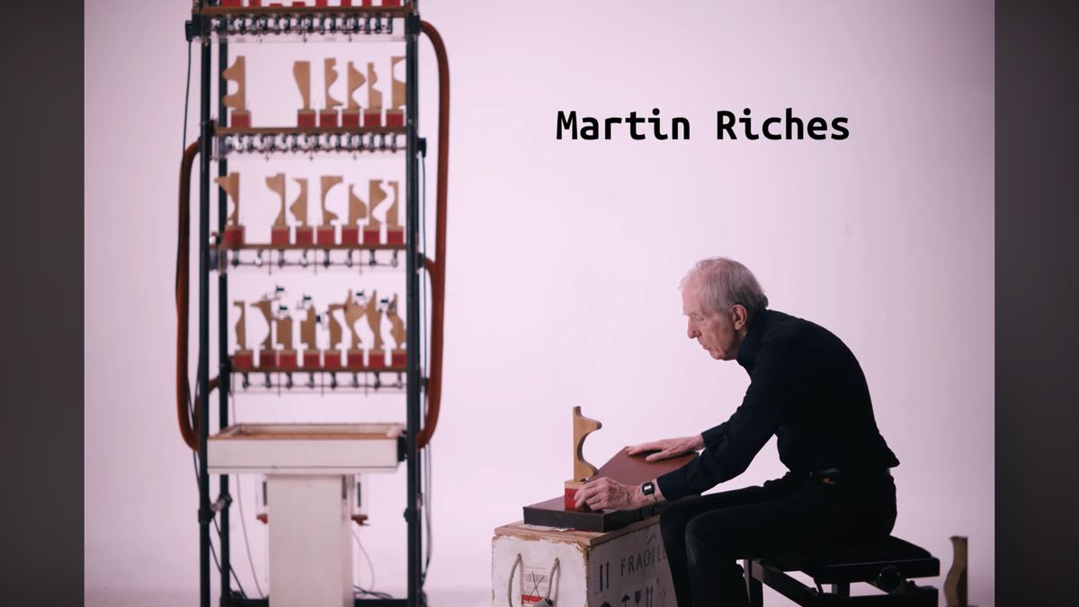 Martin Riches next to one of his music machines, studio session