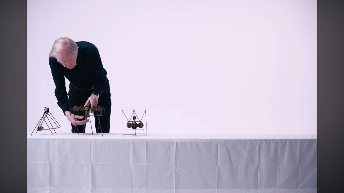Martin Riches adjusting small kinetic sound sculptures