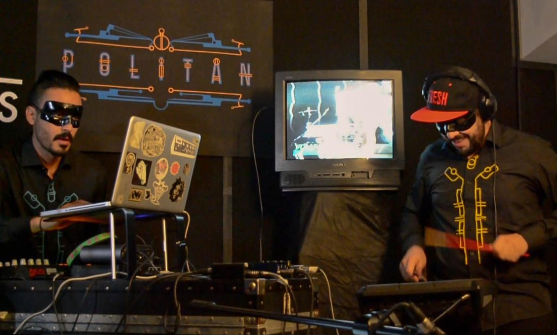 Politan live — the duo at the machines under the Politan logo