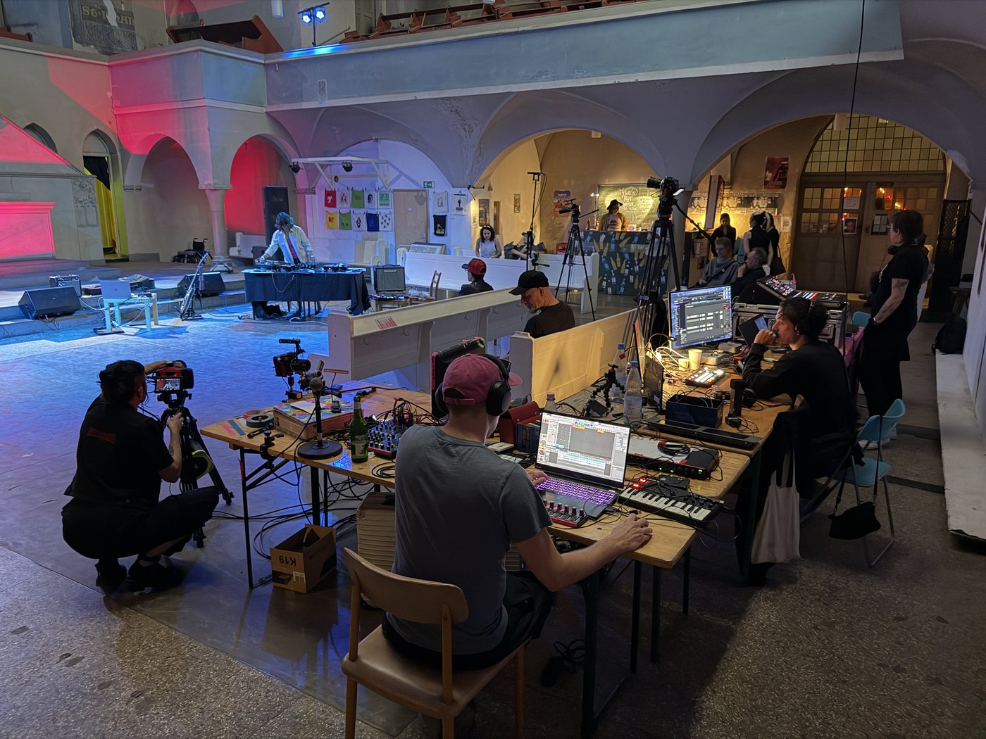 T.A.T.V. 6 — camera operator filming a performance in the Galiläakirche