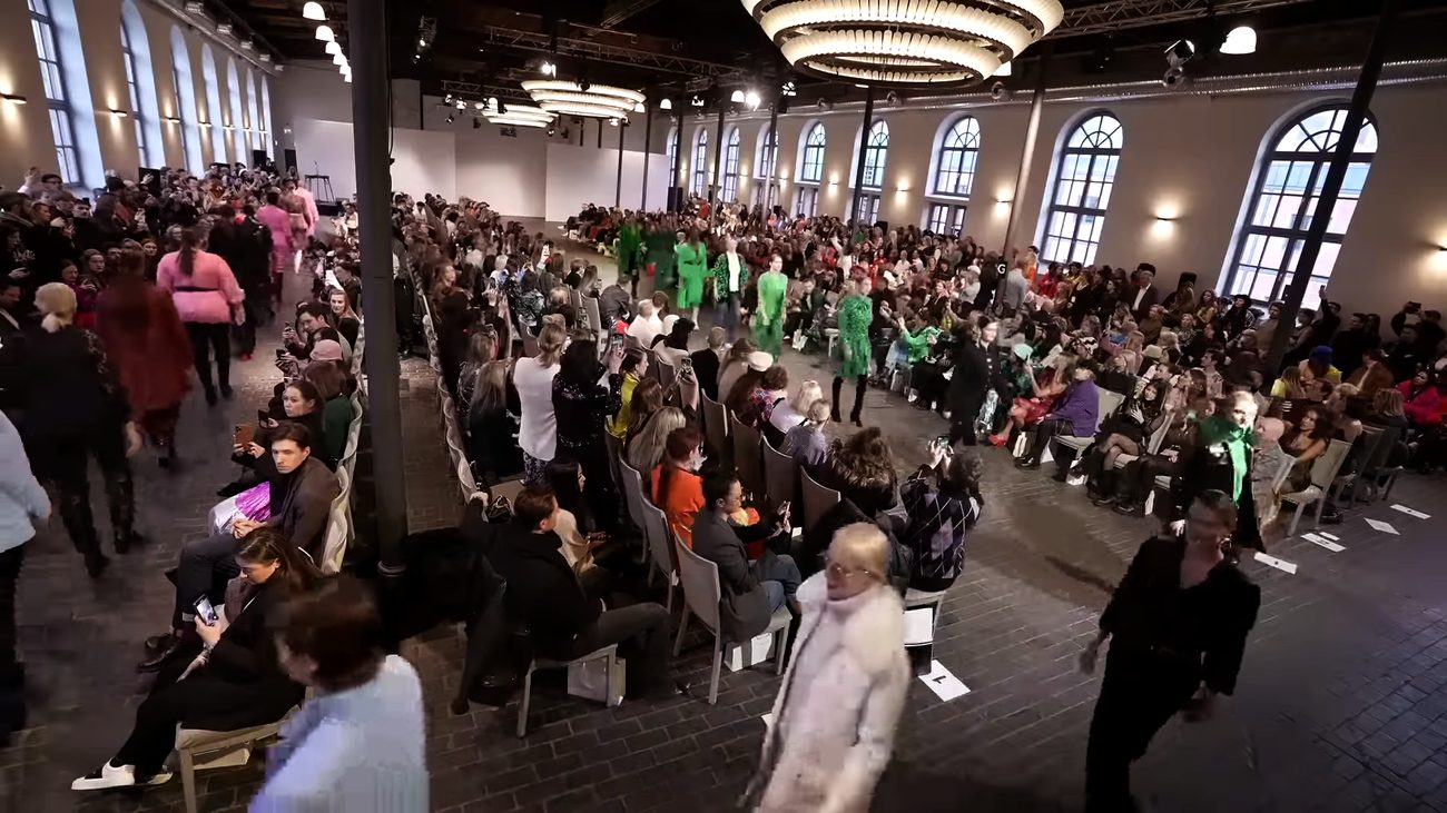 WE.4 show — wide shot of the runway and audience