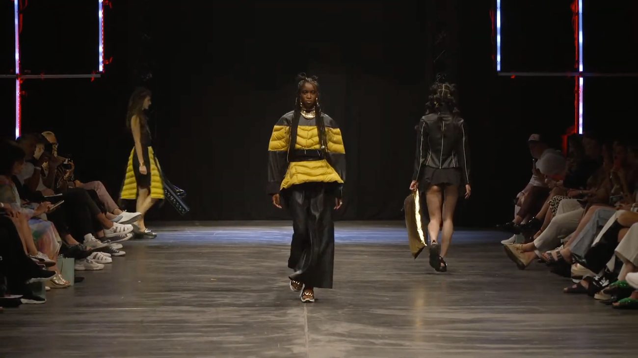 WE.4 show — full room during the finale