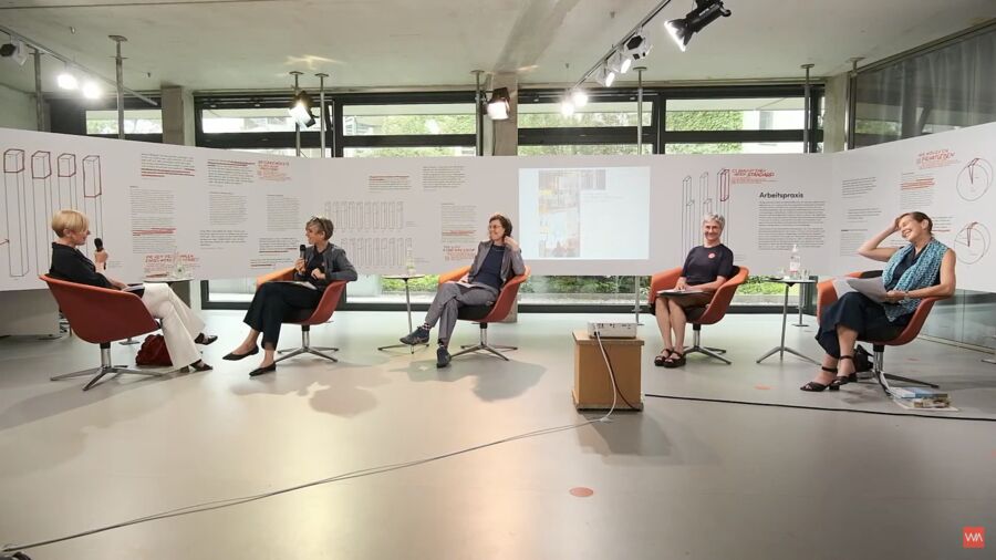 WIA Berlin livestream — speaker overlay on the Haus der Statistik
